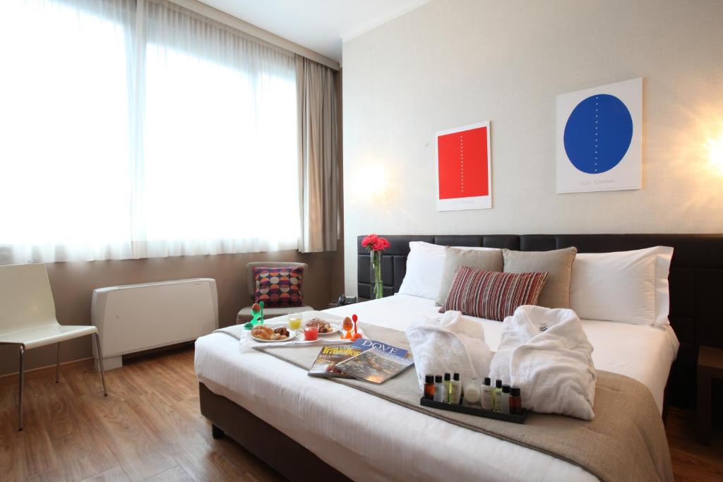 Postel nebo postele na pokoji v ubytování Hotel Oro Blu