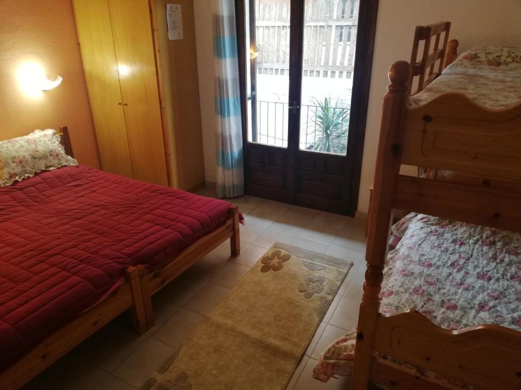 Letto o letti in una camera di Salvanos Residence
