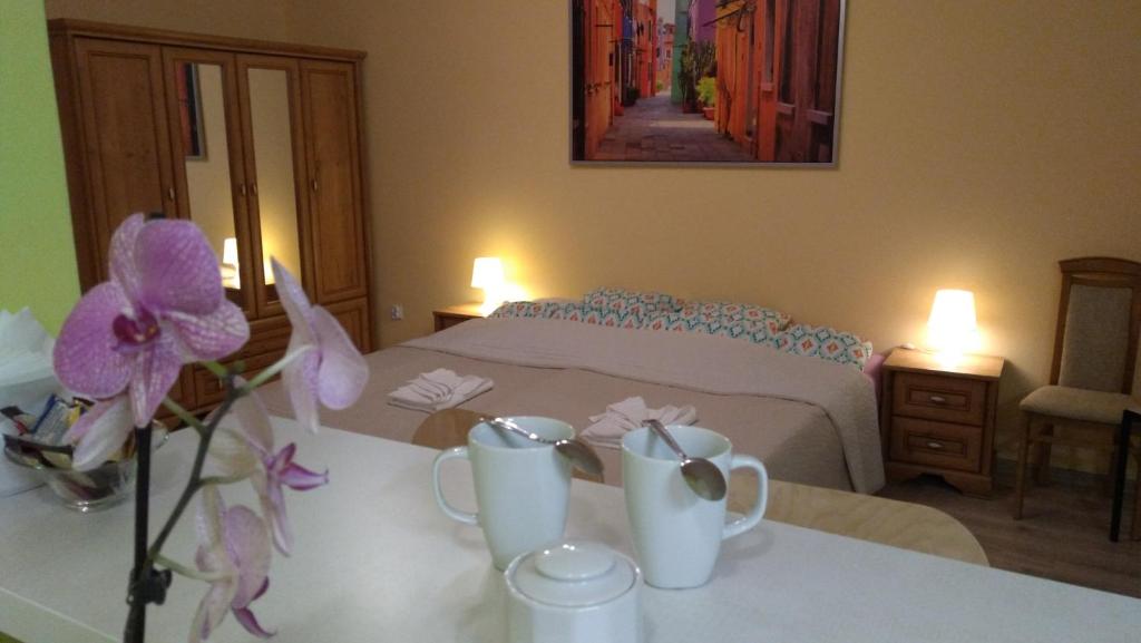Posteľ alebo postele v izbe v ubytovaní Apartament Raz Dwa Trzy