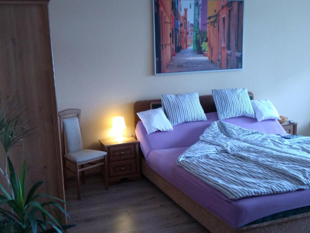 Posteľ alebo postele v izbe v ubytovaní Apartament Raz Dwa Trzy