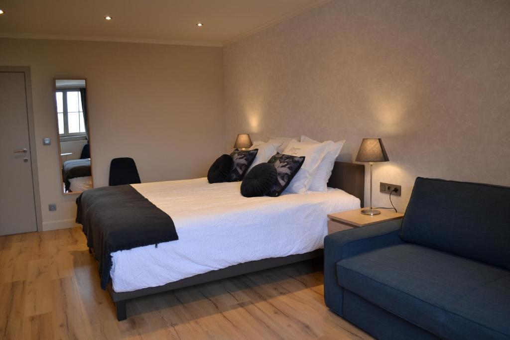 Postel nebo postele na pokoji v ubytování B&B Allegambe's Goed