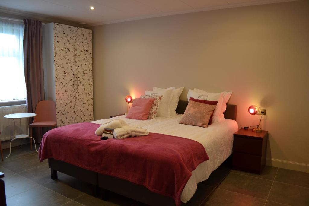 Postel nebo postele na pokoji v ubytování B&B Allegambe's Goed