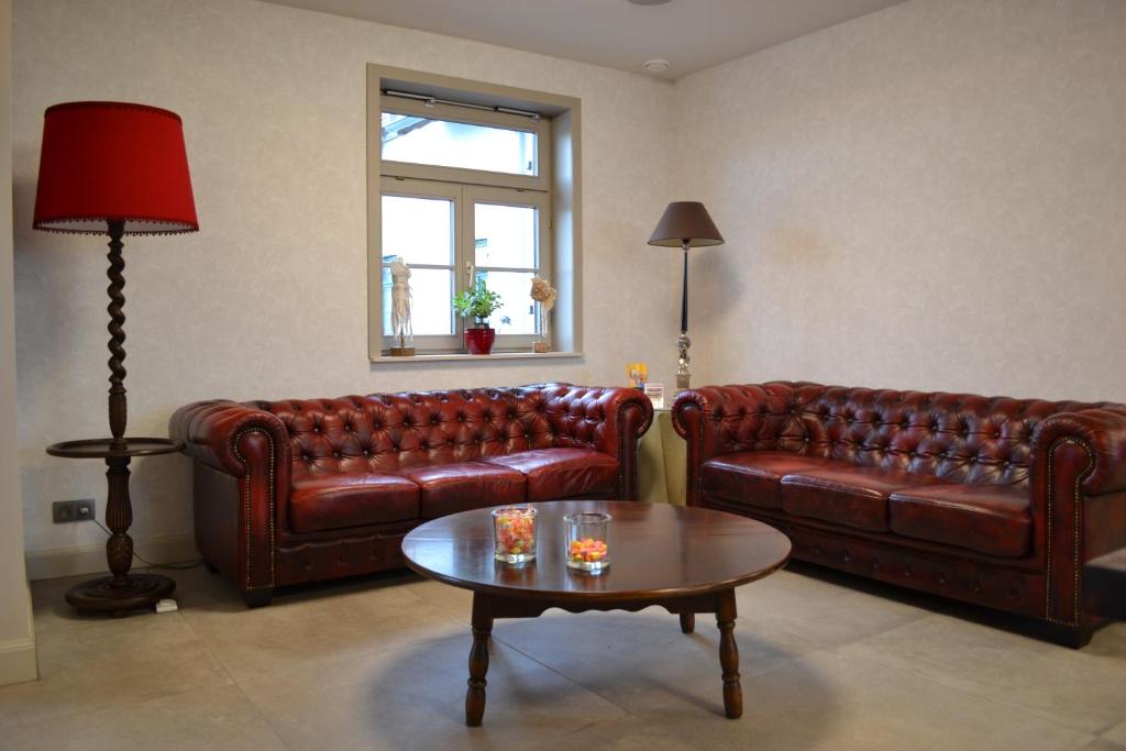 Posezení v ubytování B&B Allegambe's Goed