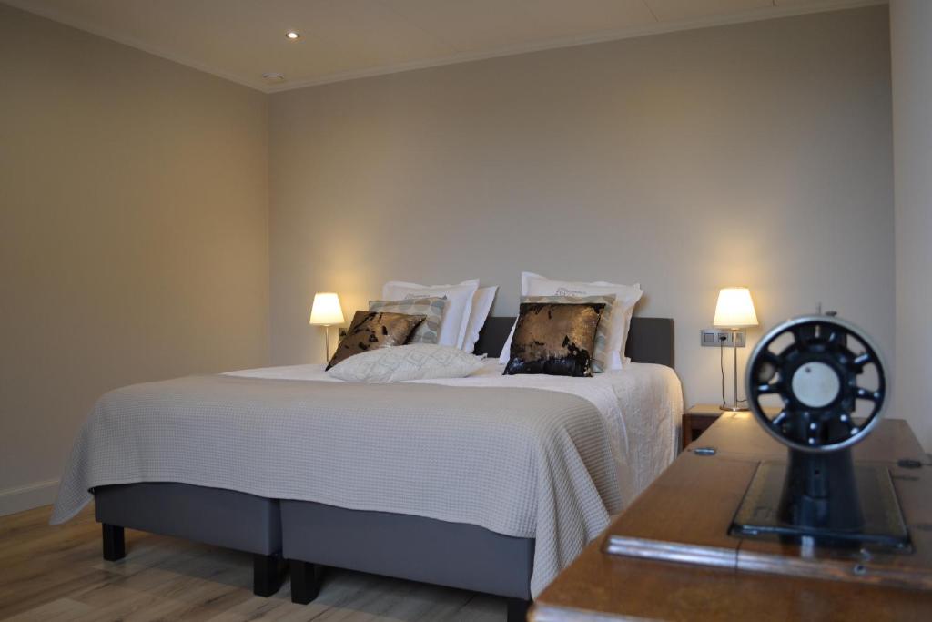 Postel nebo postele na pokoji v ubytování B&B Allegambe's Goed