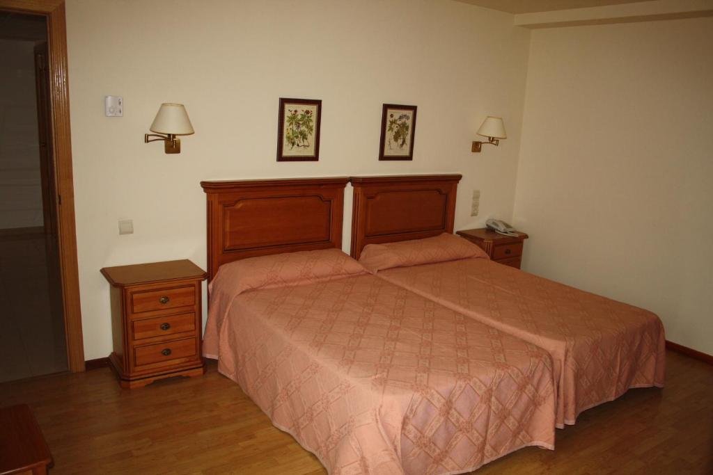 Postel nebo postele na pokoji v ubytování Hotel Mar de Aragón