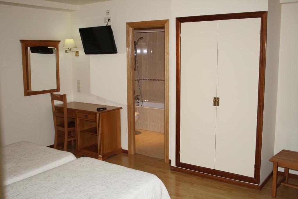 Postel nebo postele na pokoji v ubytování Hotel Mar de Aragón