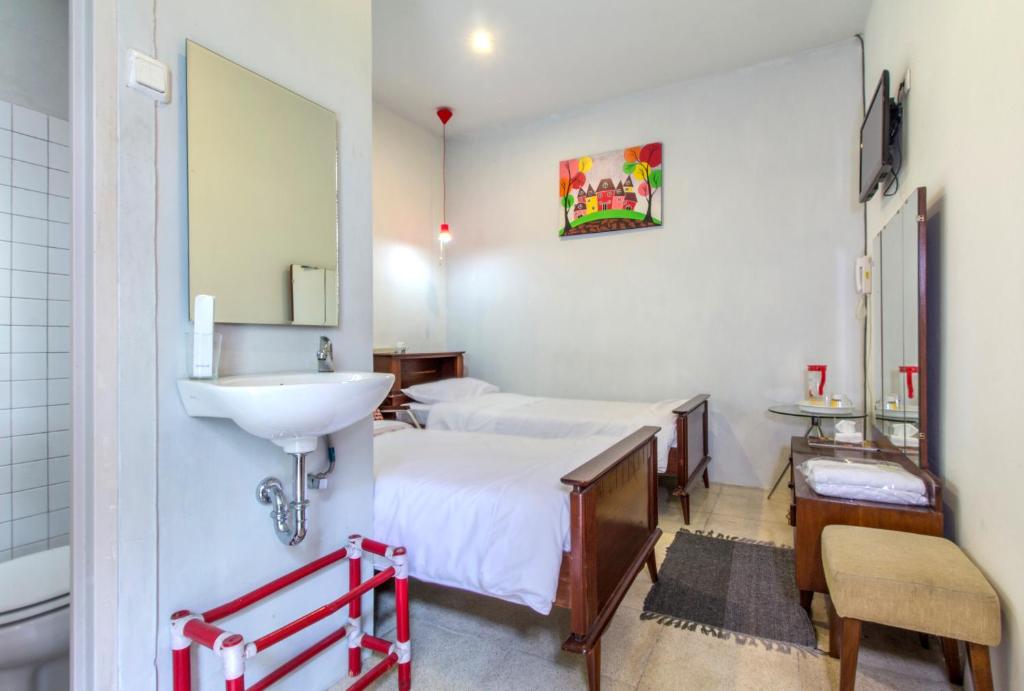 Letto o letti in una camera di Jeng Tini Guest House
