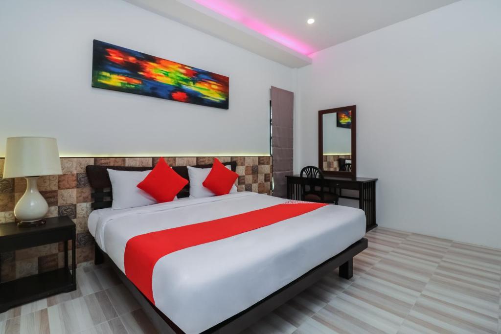 Postel nebo postele na pokoji v ubytování Baan Noppadol Hua Hin Loft