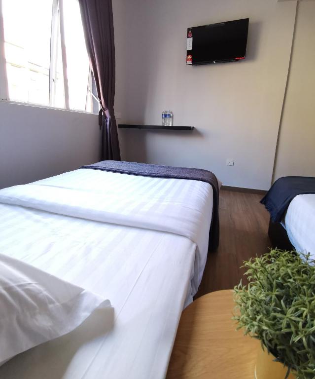 TV a/nebo společenská místnost v ubytování The Core Hotel