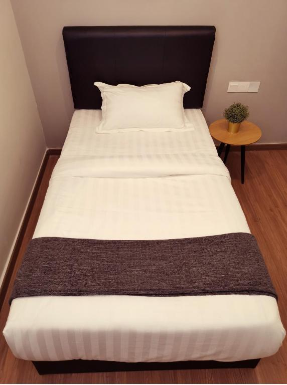 Postel nebo postele na pokoji v ubytování The Core Hotel