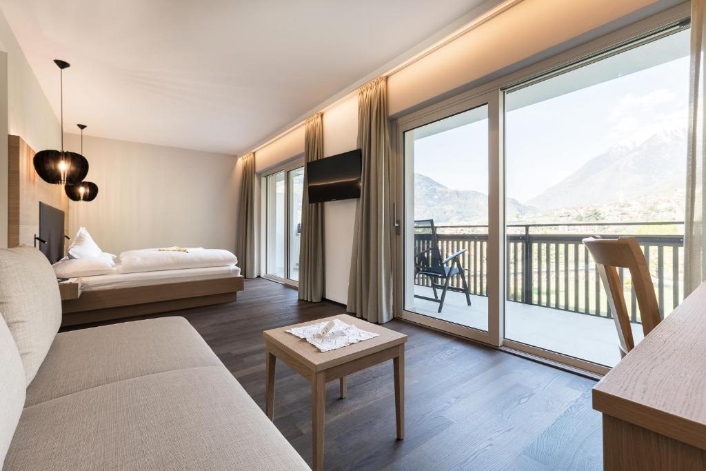 Postel nebo postele na pokoji v ubytování Hotel Wessobrunn