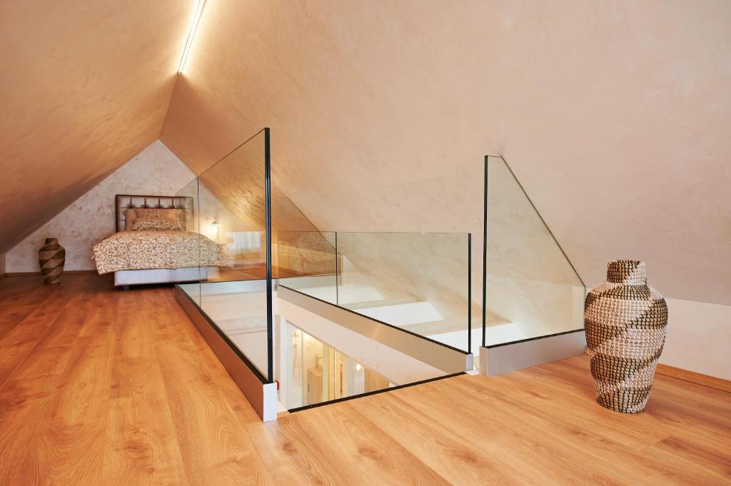 Postel nebo postele na pokoji v ubytování Hiša Ančka, Boutique Hotel & Maja Rooms