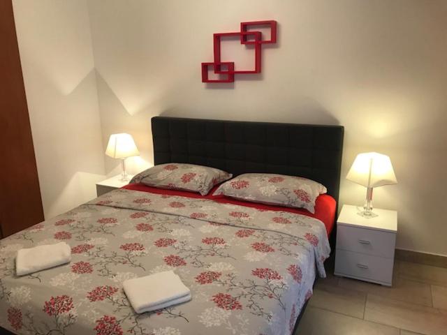 Postel nebo postele na pokoji v ubytování Korcula Apartments Iliskovic