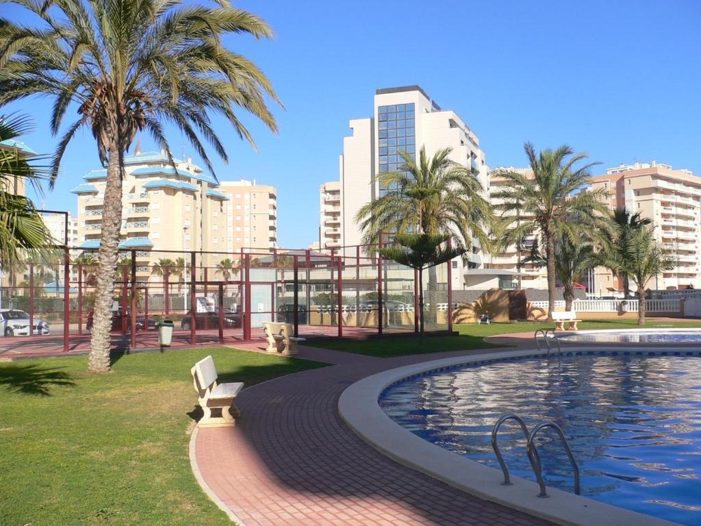 The swimming pool at or close to Miradores Del Puerto One Bedroom Apartment RP019