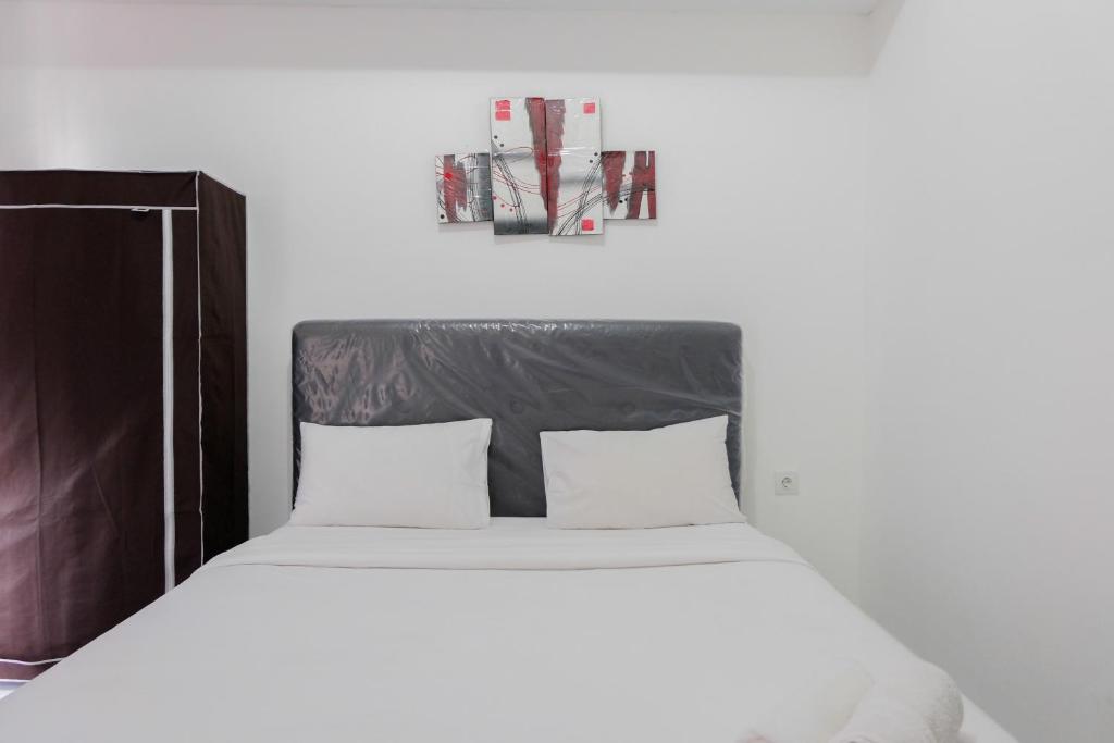 Postel nebo postele na pokoji v ubytování Modern Studio Casa De Parco Apartment By Travelio