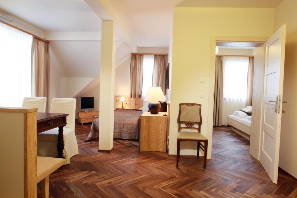 Posteľ alebo postele v izbe v ubytovaní Hotel Fahrnberger