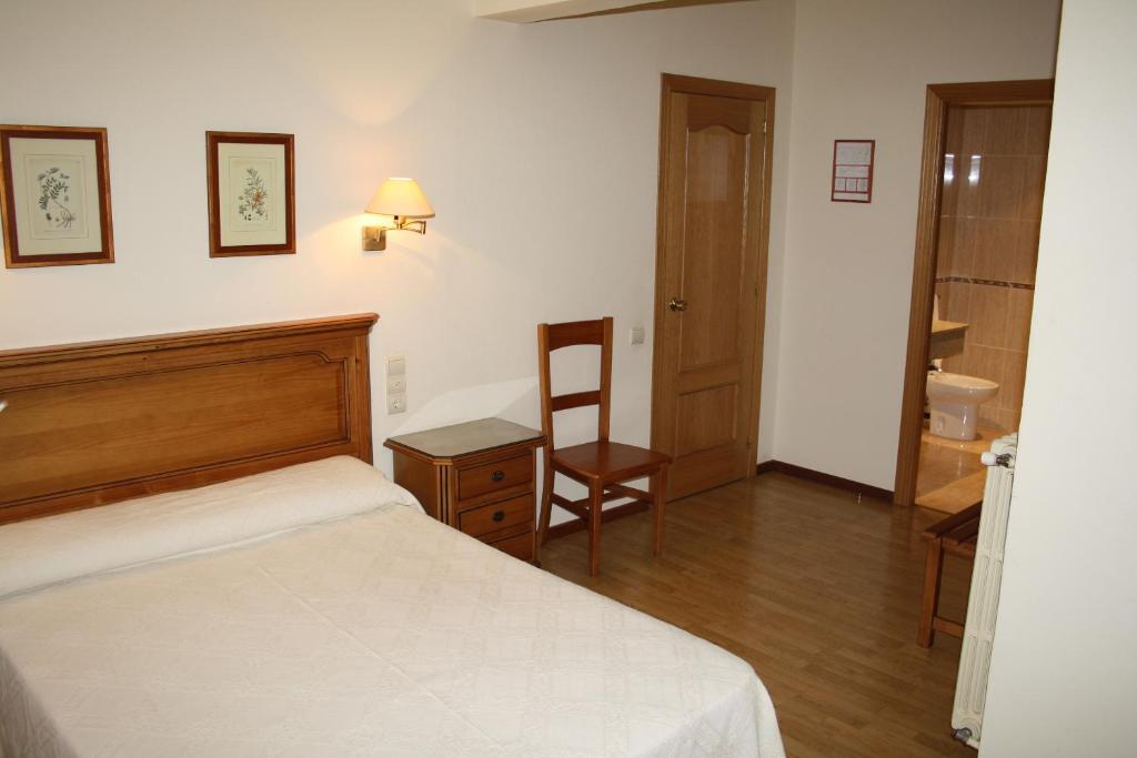 Postel nebo postele na pokoji v ubytování Hotel Mar de Aragón