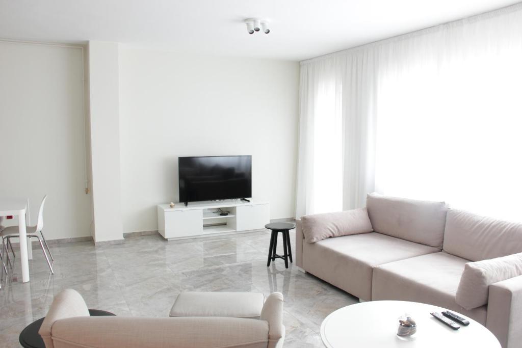 TV a/nebo společenská místnost v ubytování Lux House Olga