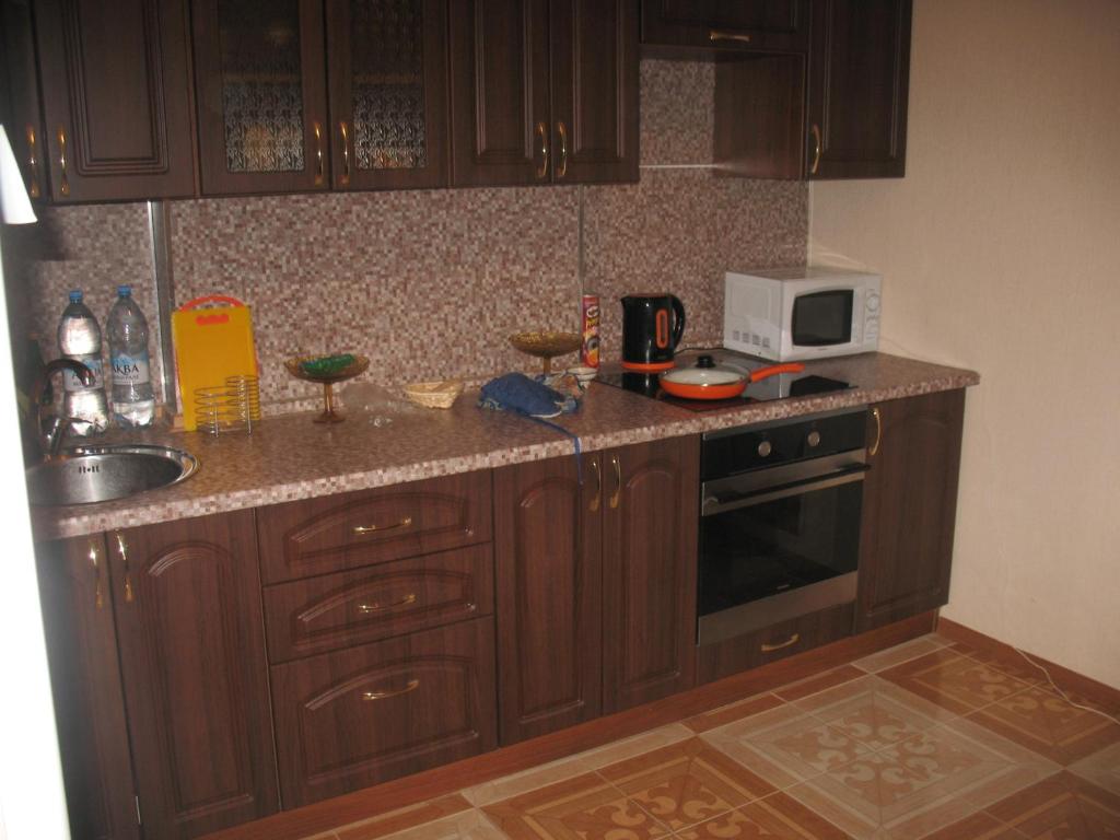 Kuchyňa alebo kuchynka v ubytovaní Апартаменты квартирного типа