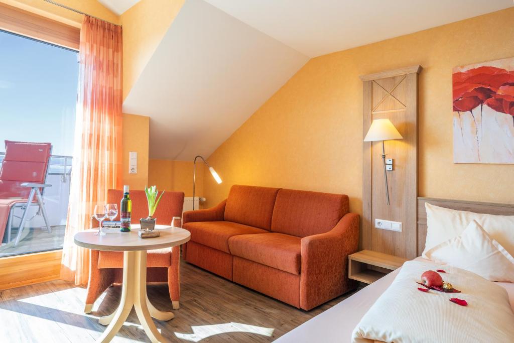 Postel nebo postele na pokoji v ubytování Hotel Mohren