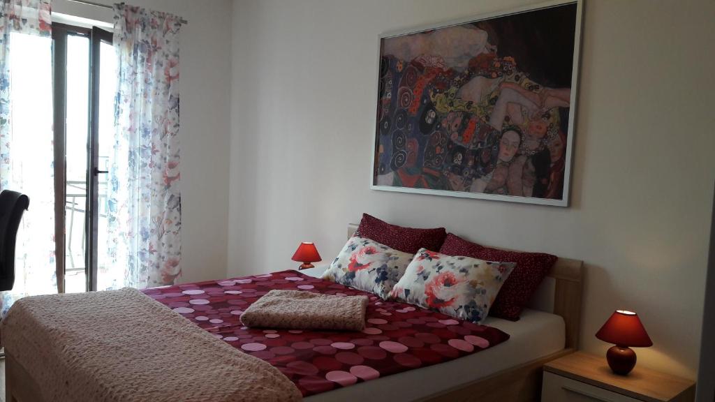 Postel nebo postele na pokoji v ubytování Apartments Nina, Pinta & Santa Maria