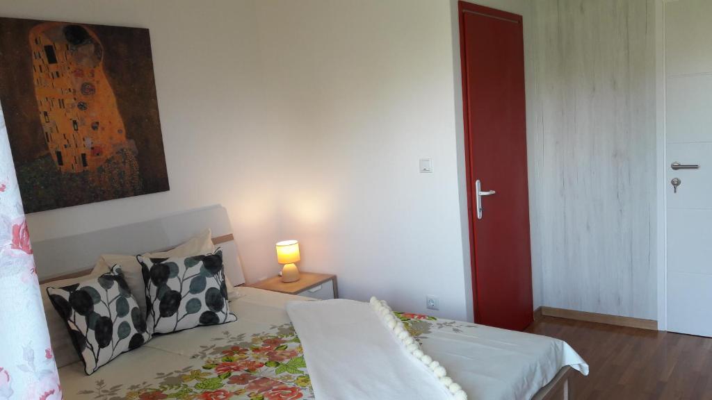 Postel nebo postele na pokoji v ubytování Apartments Nina, Pinta & Santa Maria