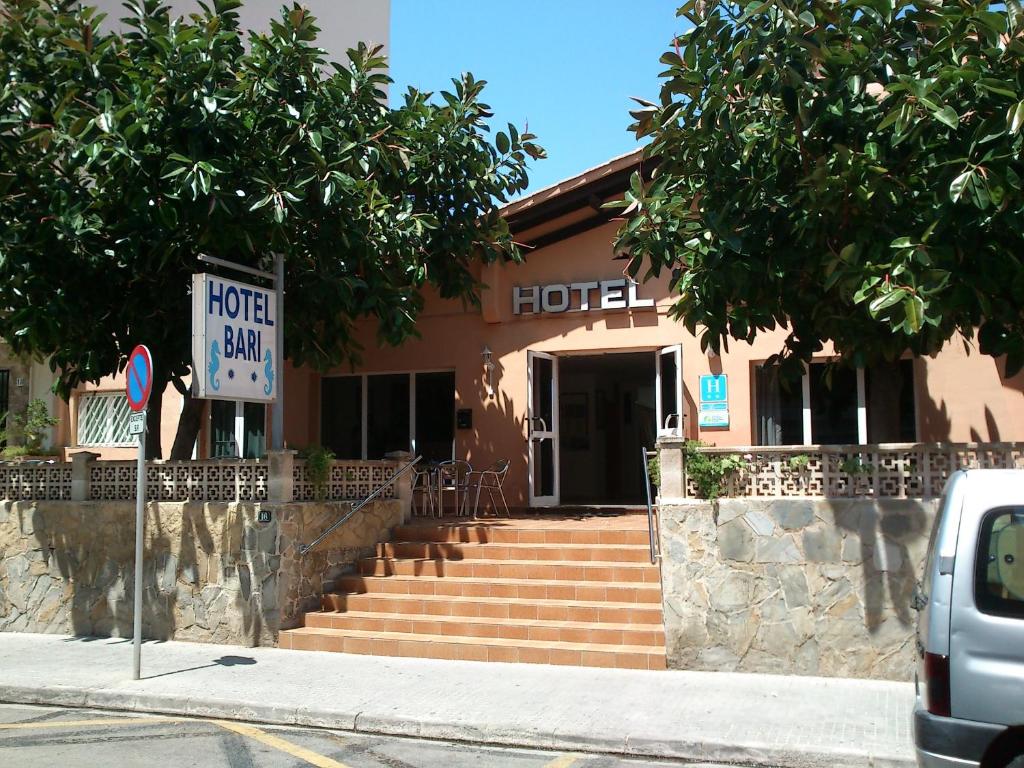 a hotel sign in front of a building at Hotel Bari in Can Pastilla