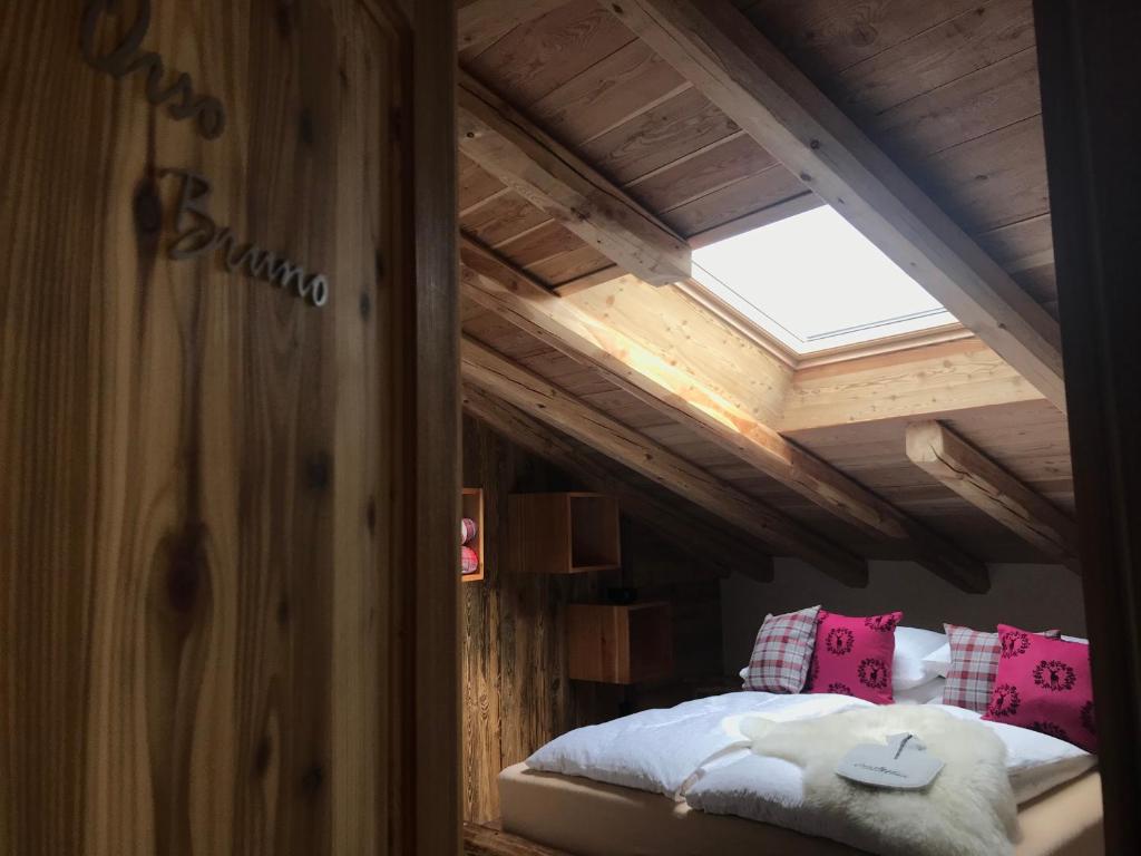 Postel nebo postele na pokoji v ubytování Grizzly Haus & Frosch Restaurant - Teritoria