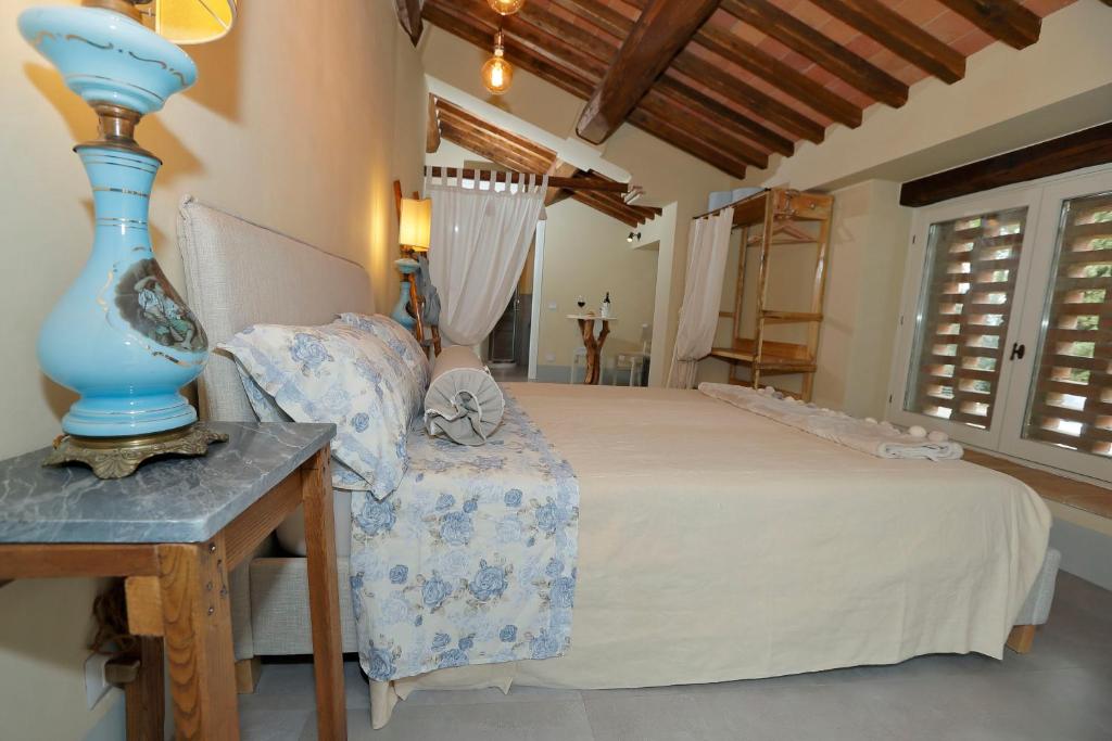 Postel nebo postele na pokoji v ubytování B&B CASAGRANDE