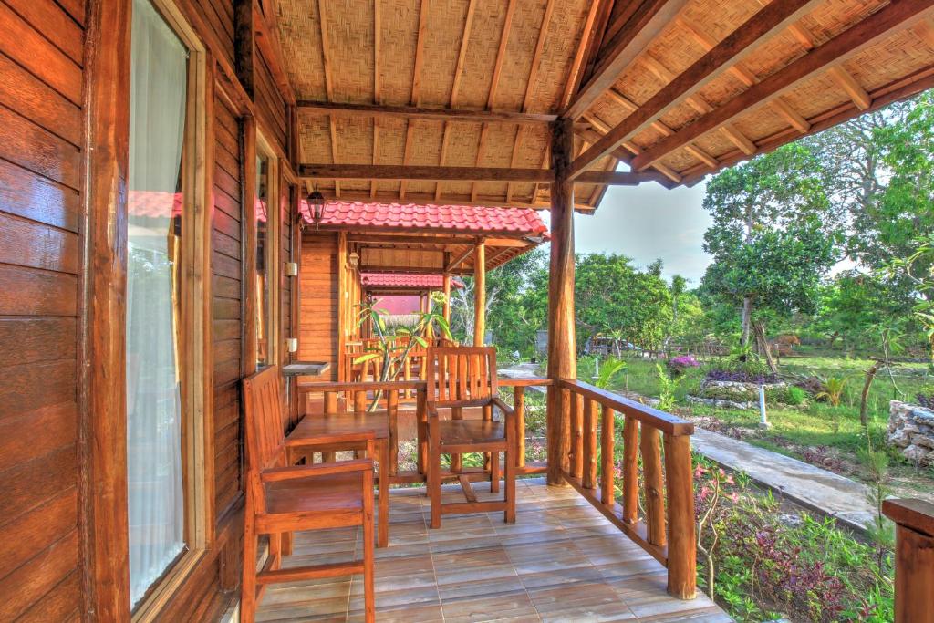 Balkón nebo terasa v ubytování Ayu Hill Bungalows