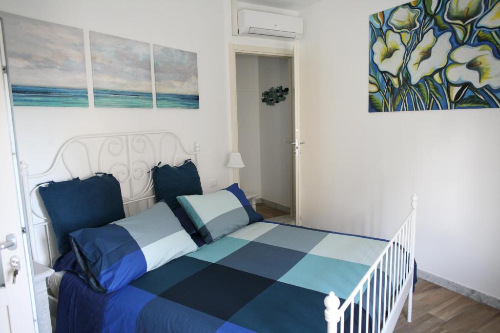 Postel nebo postele na pokoji v ubytování B&B Cà di Bollo