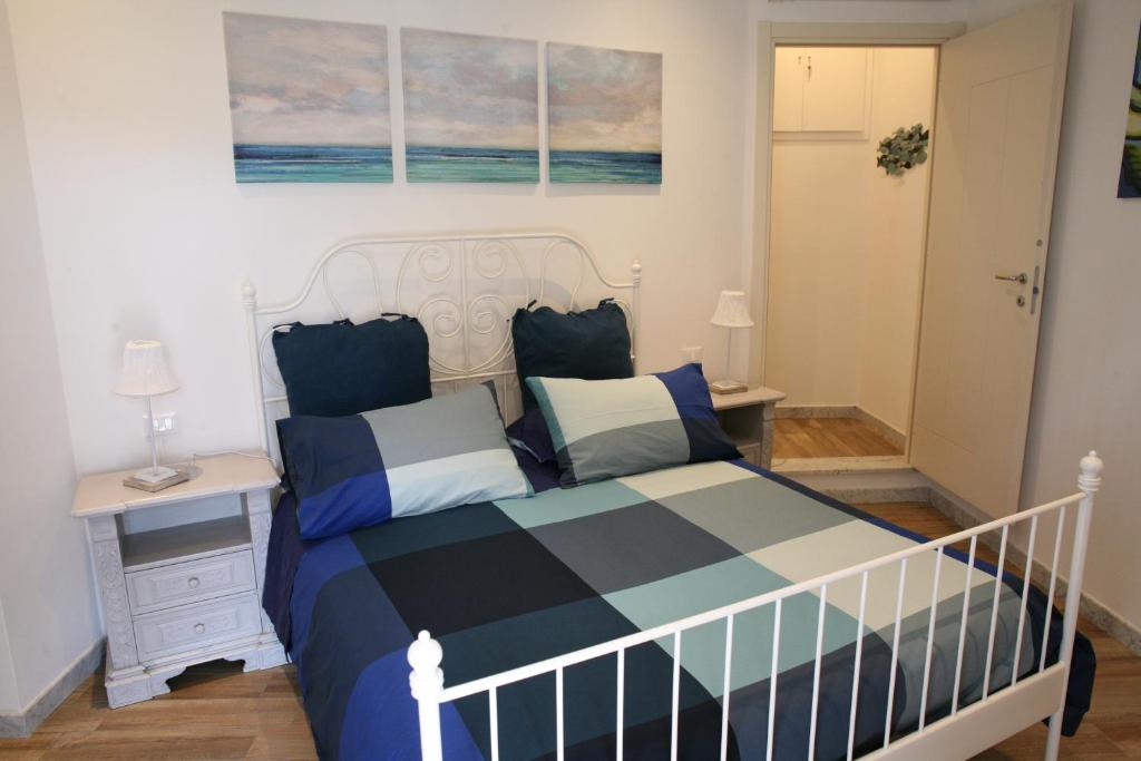 Postel nebo postele na pokoji v ubytování B&B Cà di Bollo
