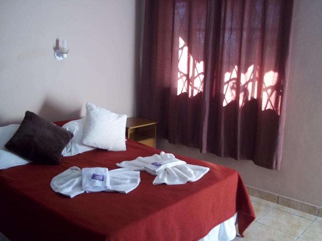 Postel nebo postele na pokoji v ubytování Posada Iguazu Royal