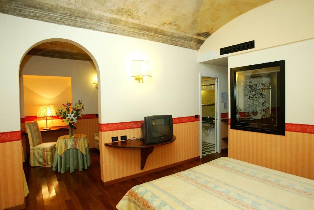Postel nebo postele na pokoji v ubytování Hotel Due Mondi