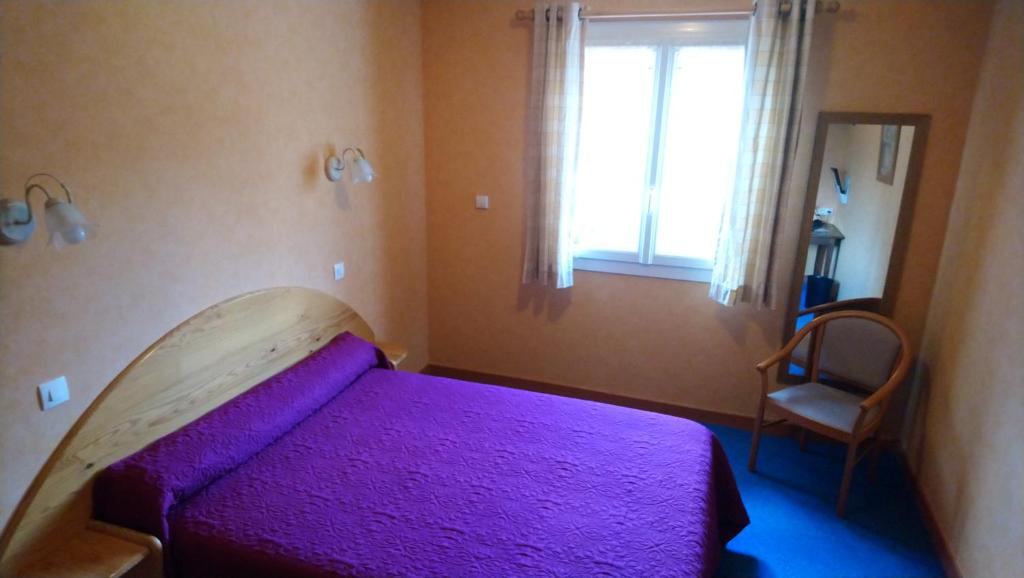 Postel nebo postele na pokoji v ubytování L'Escale de Die