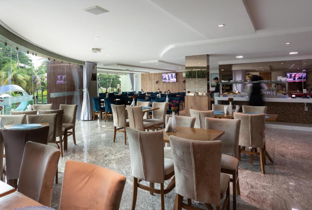 Um restaurante ou outro lugar para comer em Nord Luxxor Cabo Branco