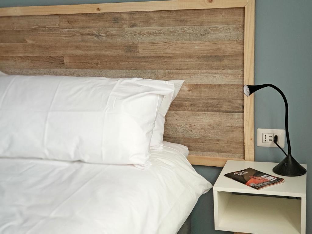 Postel nebo postele na pokoji v ubytování Hotel Jardin Atacama