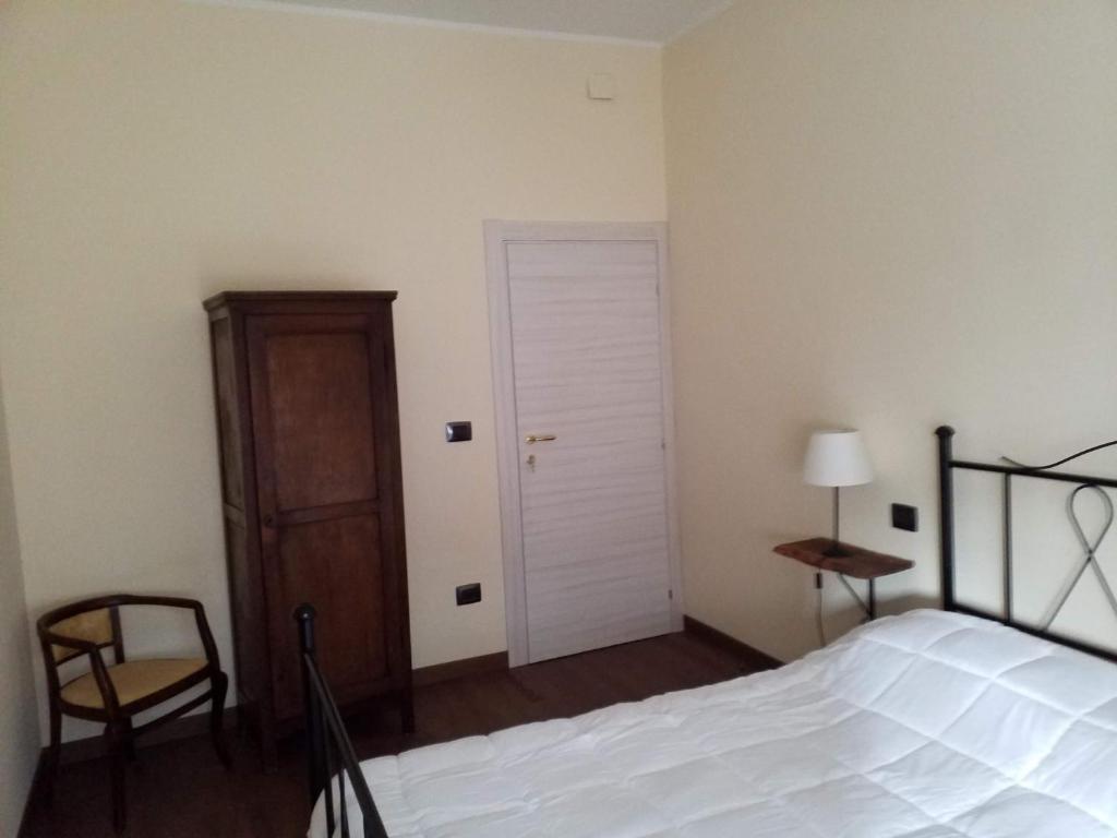 Postel nebo postele na pokoji v ubytování Residenza La Dimora ImPerfetta