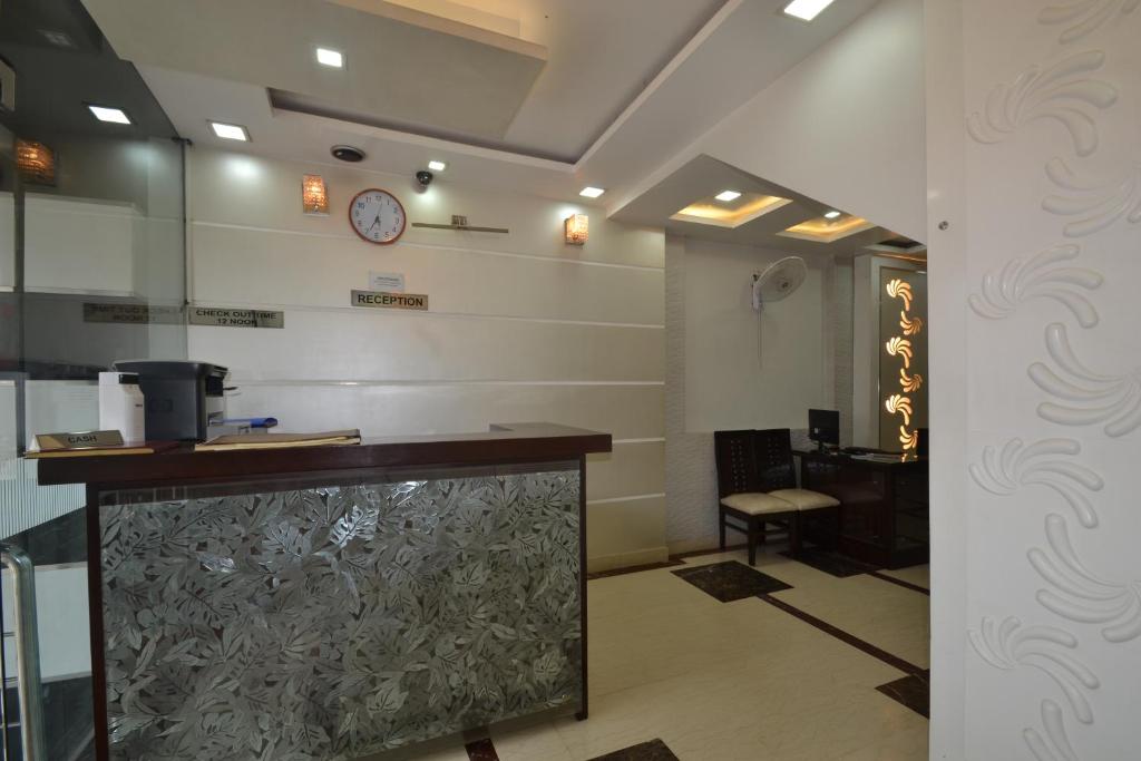 Kuchyň nebo kuchyňský kout v ubytování Hotel Central Residency