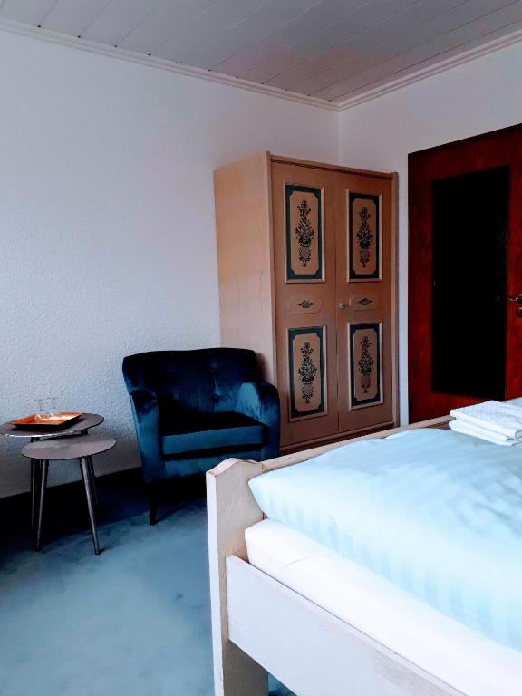 Postel nebo postele na pokoji v ubytování Landhaus Brockenblick