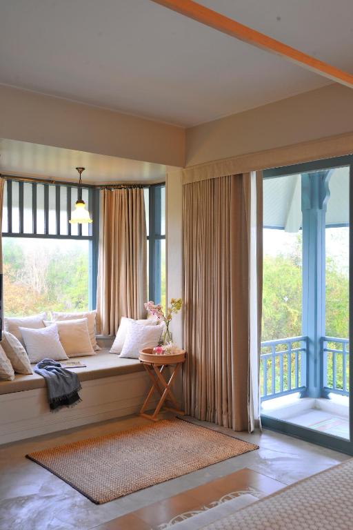 Posezení v ubytování Devasom Hua Hin Resort