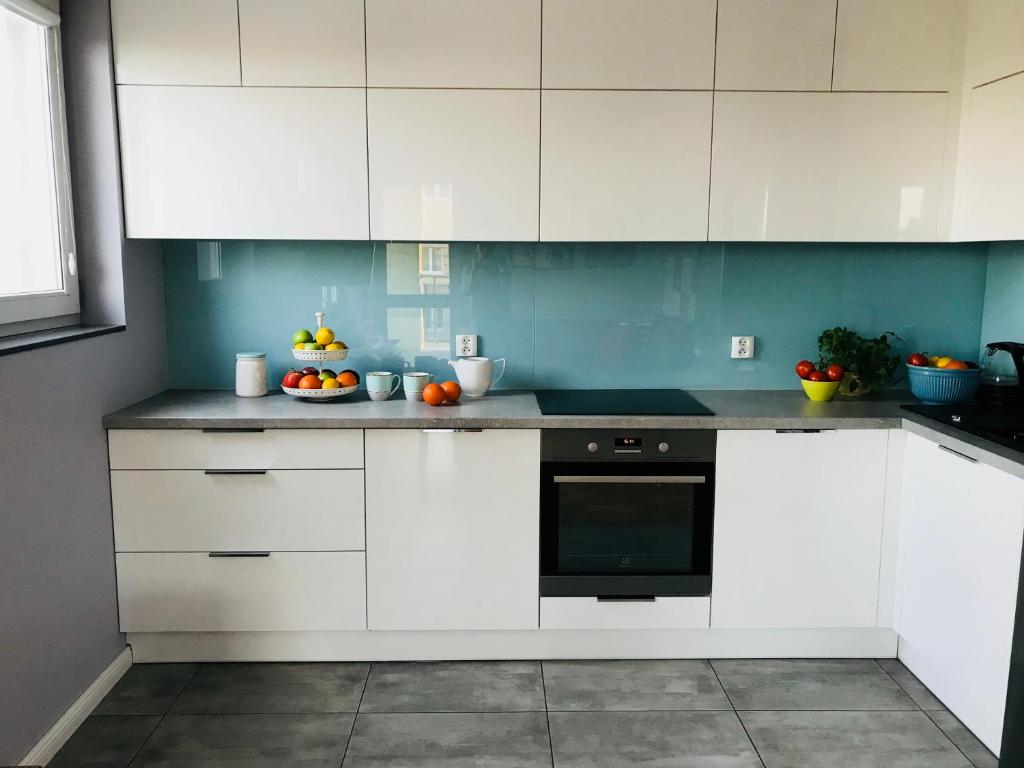 Kuchyň nebo kuchyňský kout v ubytování Słoneczne Skorosze