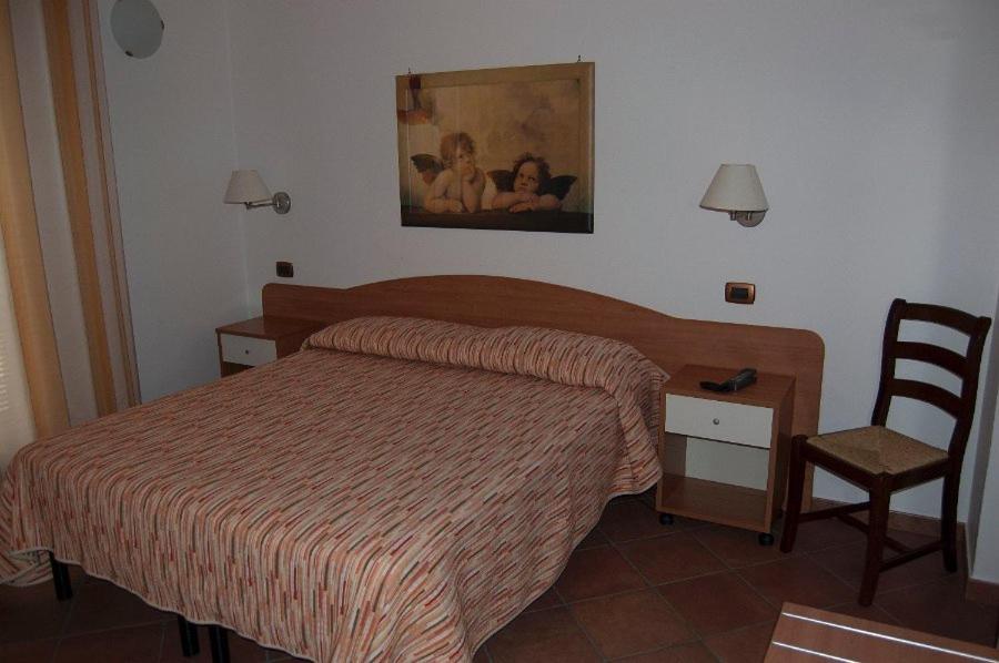 Postel nebo postele na pokoji v ubytování Il Rustico