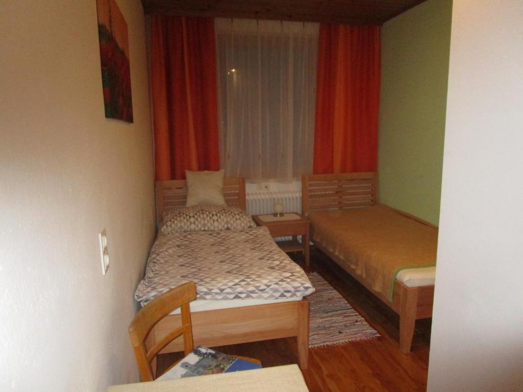 Postel nebo postele na pokoji v ubytování Dorfwirtshaus Rauch