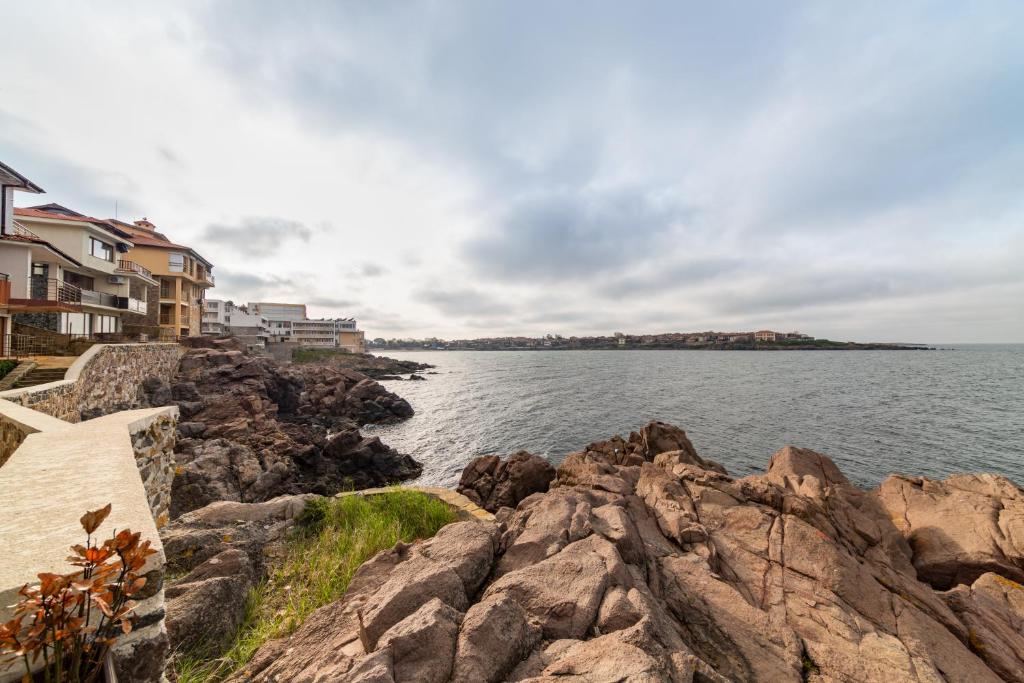 a view of a body of water with rocks at Sozopol Seaside Villa in Sozopol