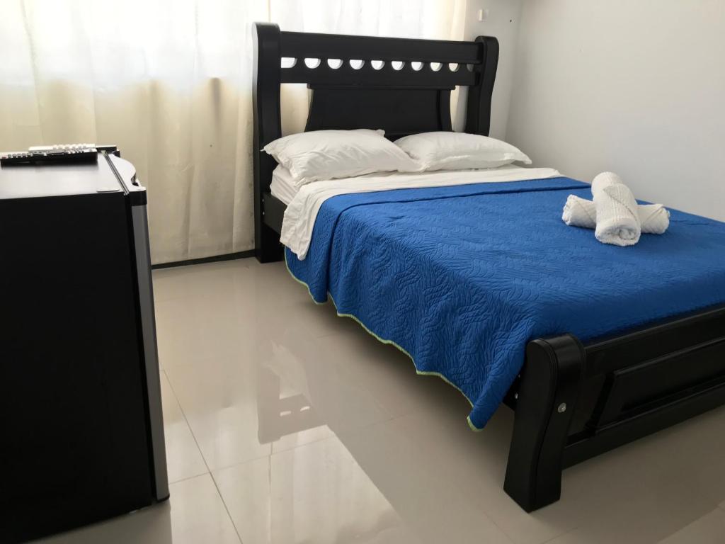 Postel nebo postele na pokoji v ubytování Alojamiento View Jhony Cay