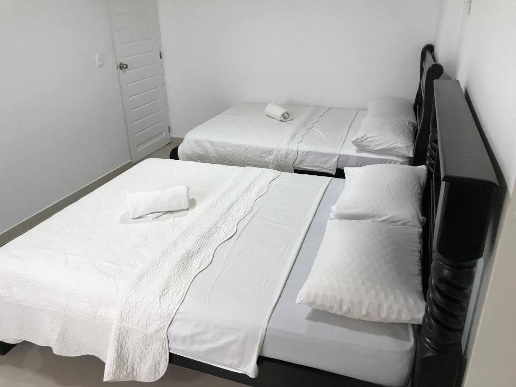 Postel nebo postele na pokoji v ubytování Alojamiento View Jhony Cay