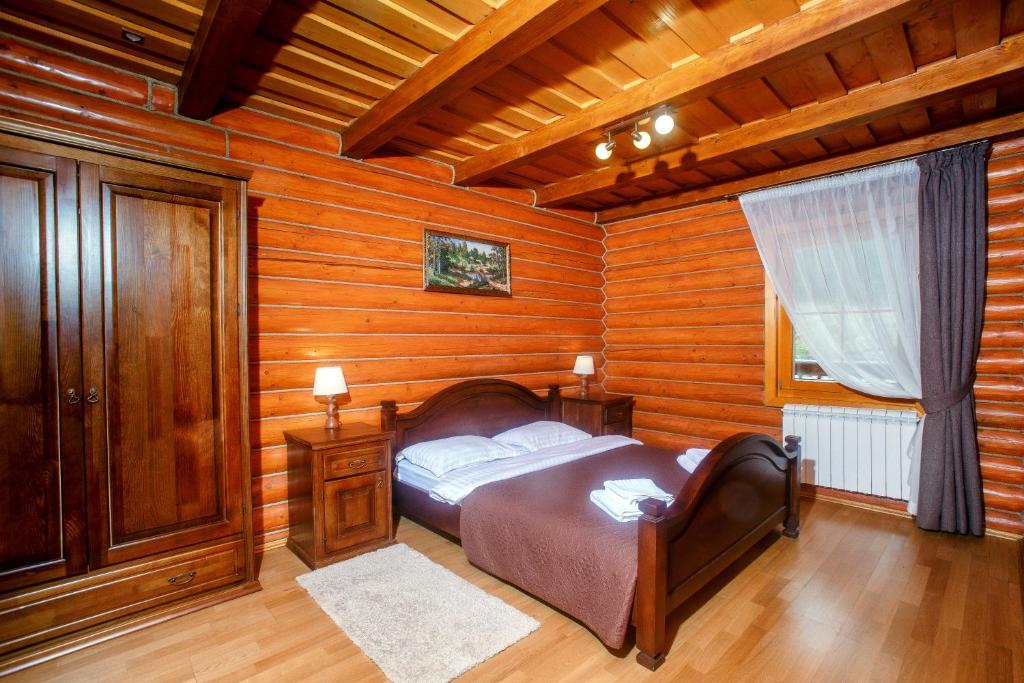 Postel nebo postele na pokoji v ubytování Toursit Complex Polyana Kvasova