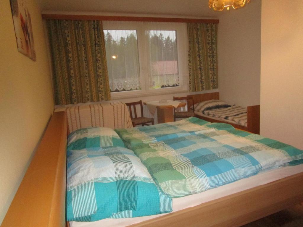 Postel nebo postele na pokoji v ubytování Dorfwirtshaus Rauch