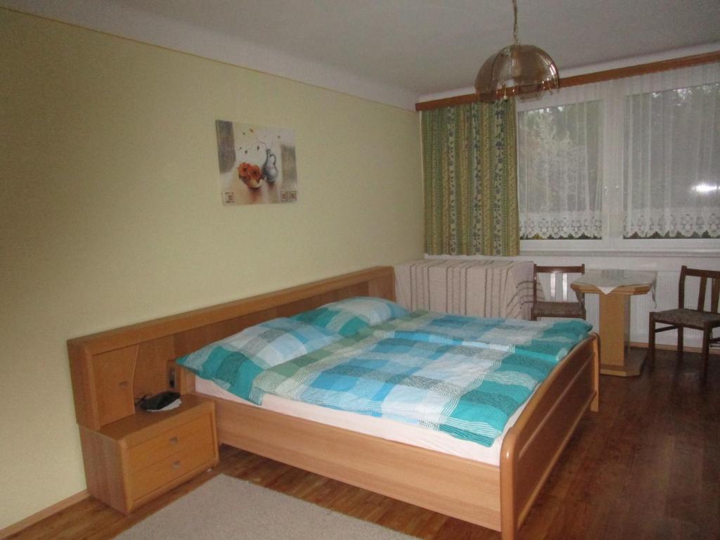 Postel nebo postele na pokoji v ubytování Dorfwirtshaus Rauch